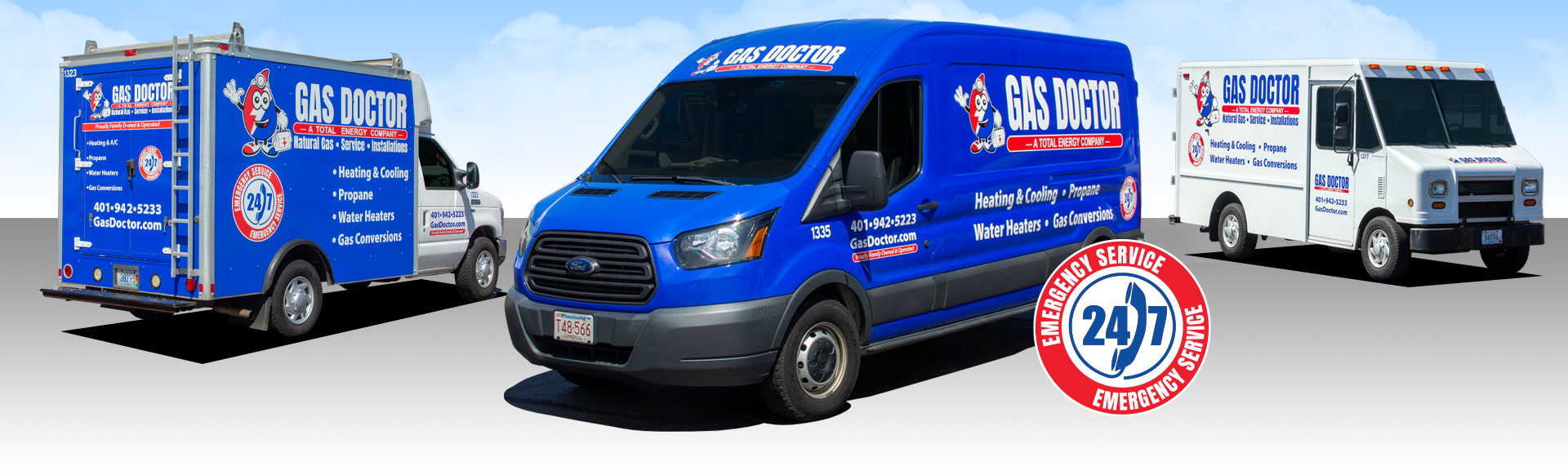 Gas Doctor service van alongside Santoro oil and propane delivery trucks